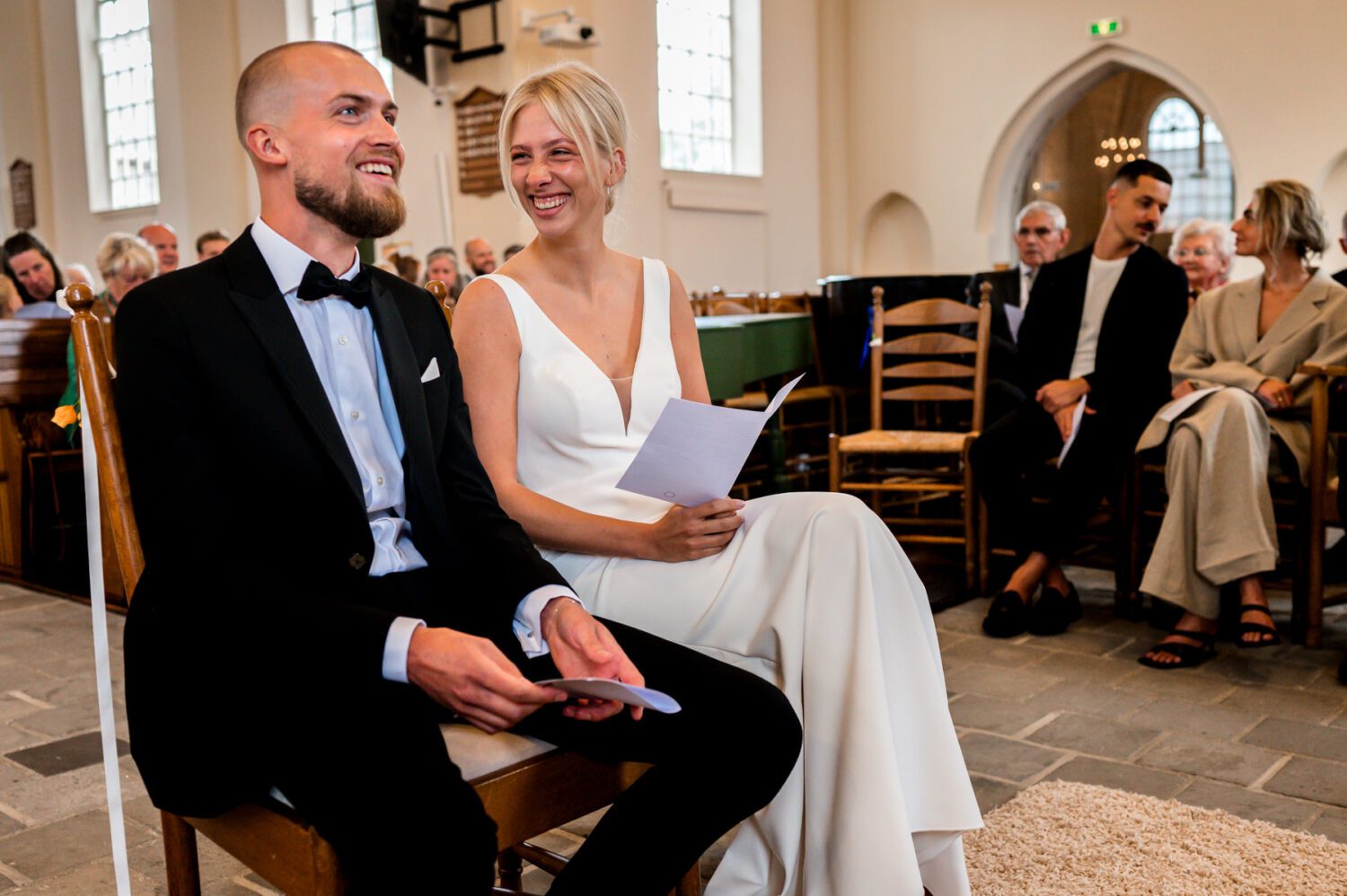 Bruidspaar trouwfotograaf kerkelijke ceremonie Den Ham Overijssel